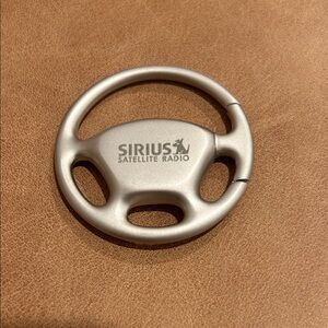SIRIUS Satellite Radio Small Silver Steering Wheel Keychain W/Logo / Authentic